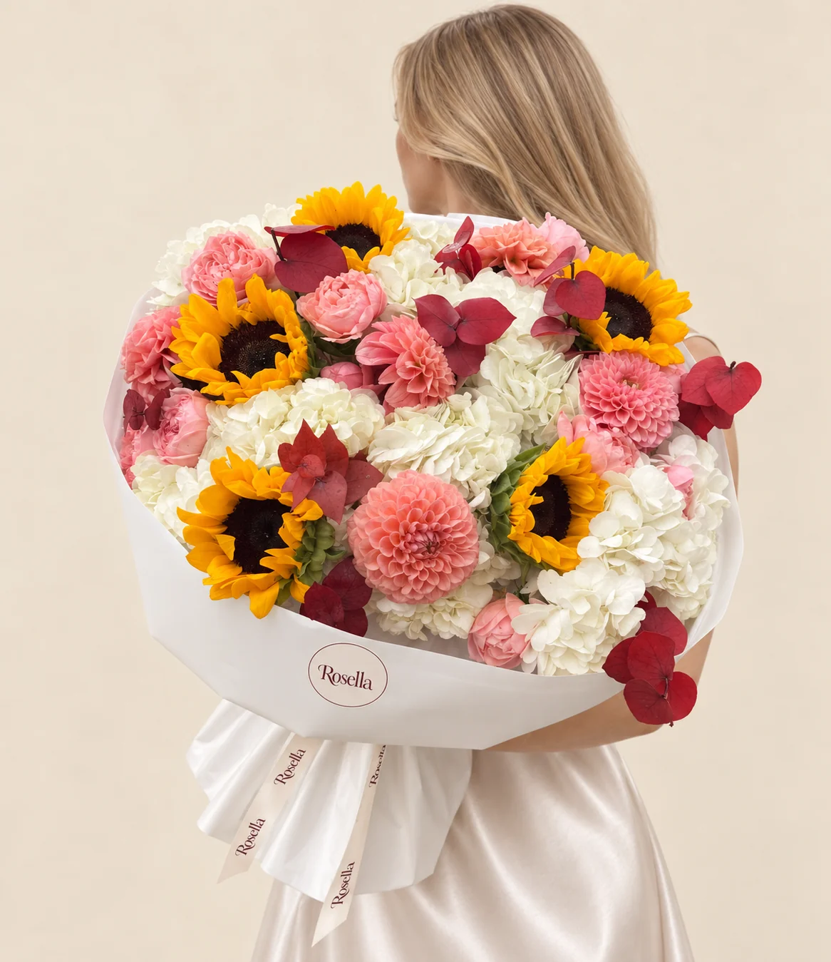 10 hydrangeas, 11 garden roses, 5 sunflowers, 2 pink dahlias & 1 peach dahlia in a hand-tied bouquet