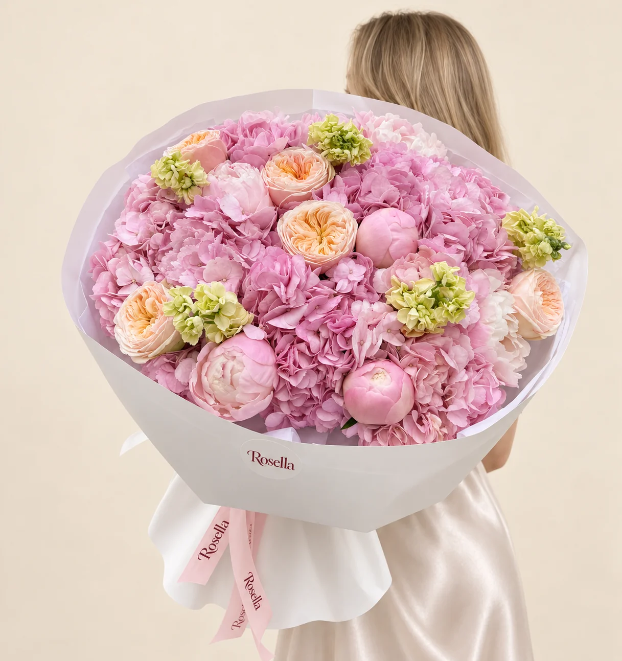 6 hydrangeas, 6 garden roses, 5 pink peonies, 4 stocks & 2 white peonies in a hand-tied bouquet