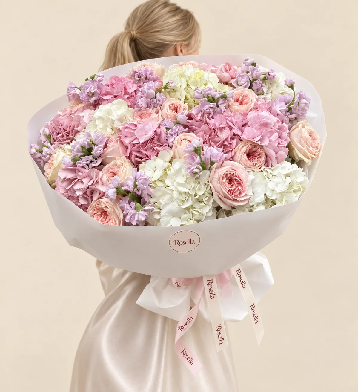 7 pink hydrangeas, 16 garden roses, 6 white hydrangeas & 6 stocks in a hand-tied bouquet