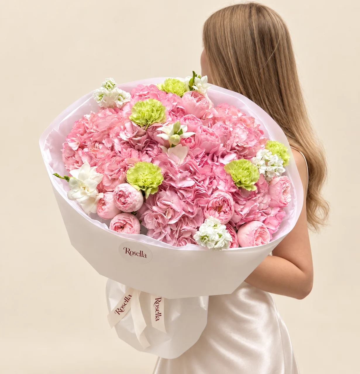 7 hydrangeas, 15 garden roses, 5 carnations, 2 stocks & 3 freesias in a hand-tied bouquet