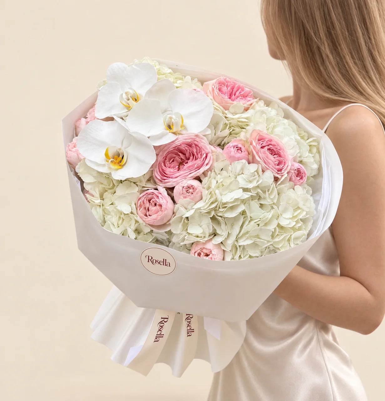 6 hydrangeas, 12 garden roses & 3 orchid blooms in a hand-tied bouquet