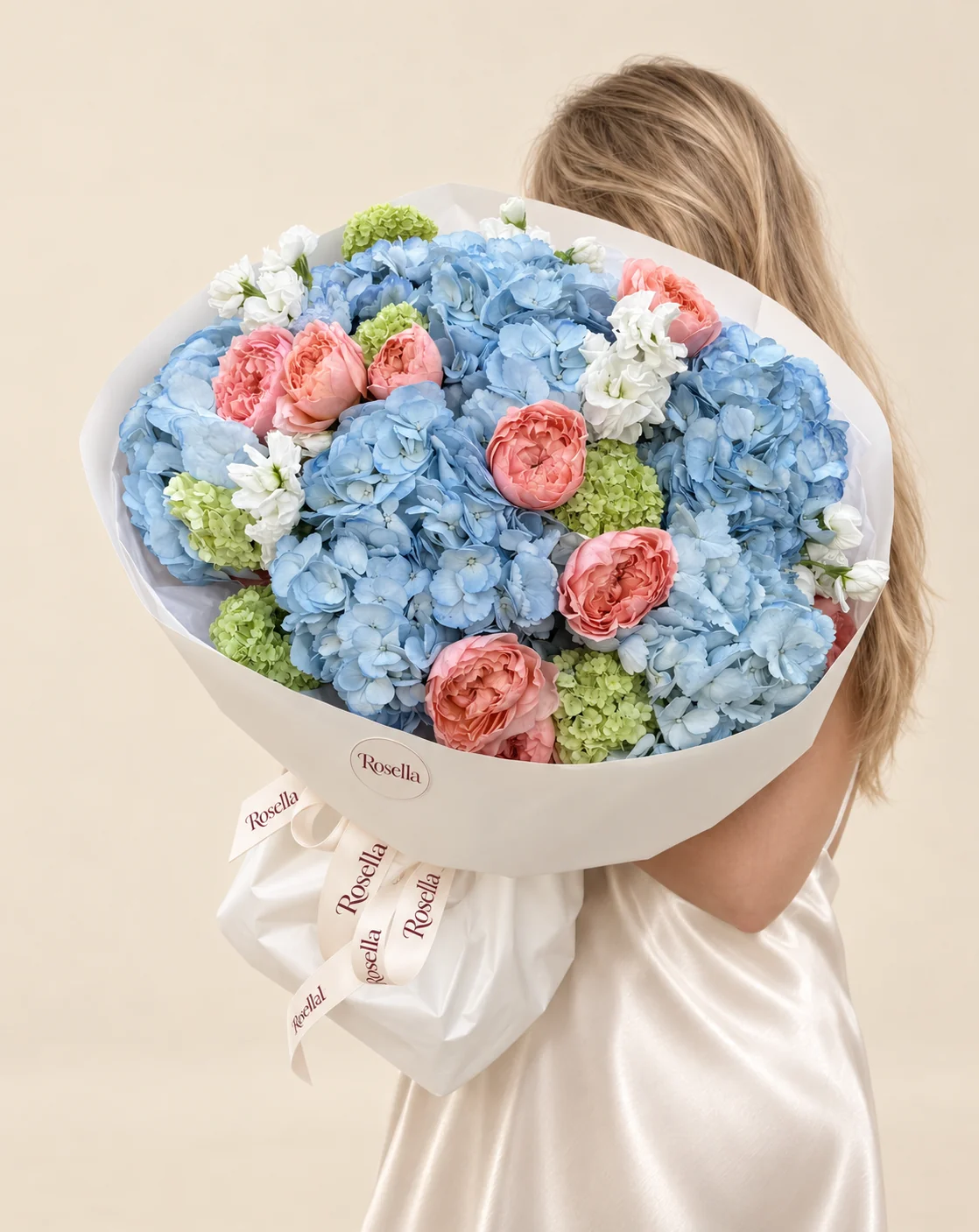 7 hydrangeas, 11 garden roses & 2 stocks in a hand-tied bouquet