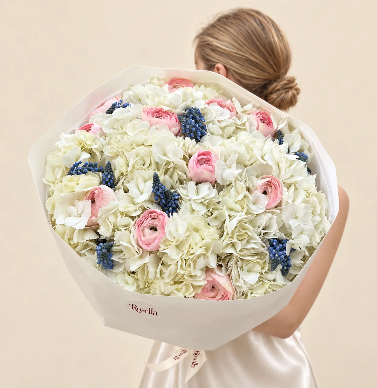 7 hydrangeas, 28 blue muscari (grape hyacinth) & 12 ranunculus in a hand-tied bouquet