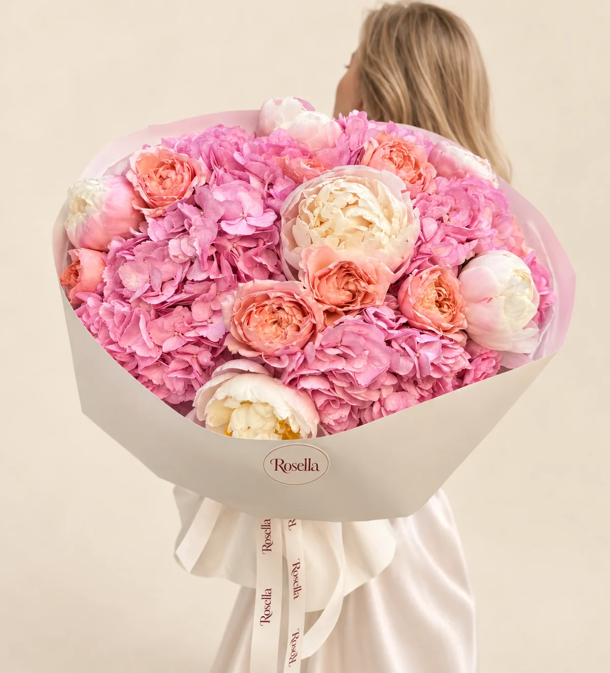 6 hydrangeas, 8 peonies & 10 spray roses in a hand-tied bouquet