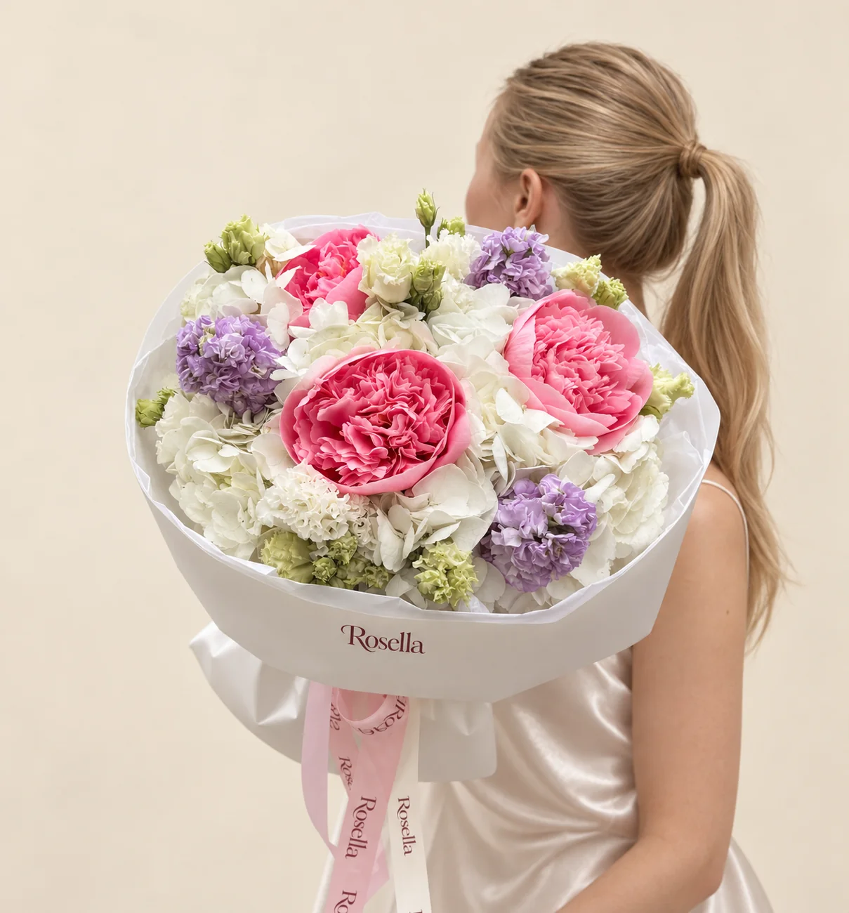 5 hydrangeas, 3 peonies, 16 green lisianthus blooms, 3 lavender stocks, 2 white stocks & 3 ivory lisianthus blooms in a hand-tied bouquet