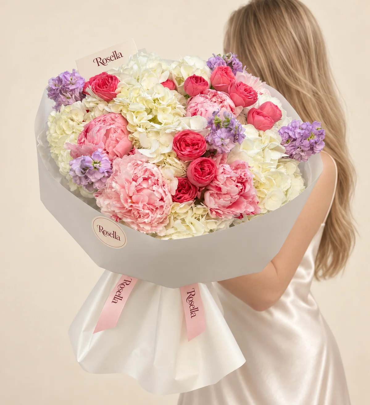 8 hydrangeas, 6 peonies, 12 roses & 4 stocks in a hand-tied bouquet