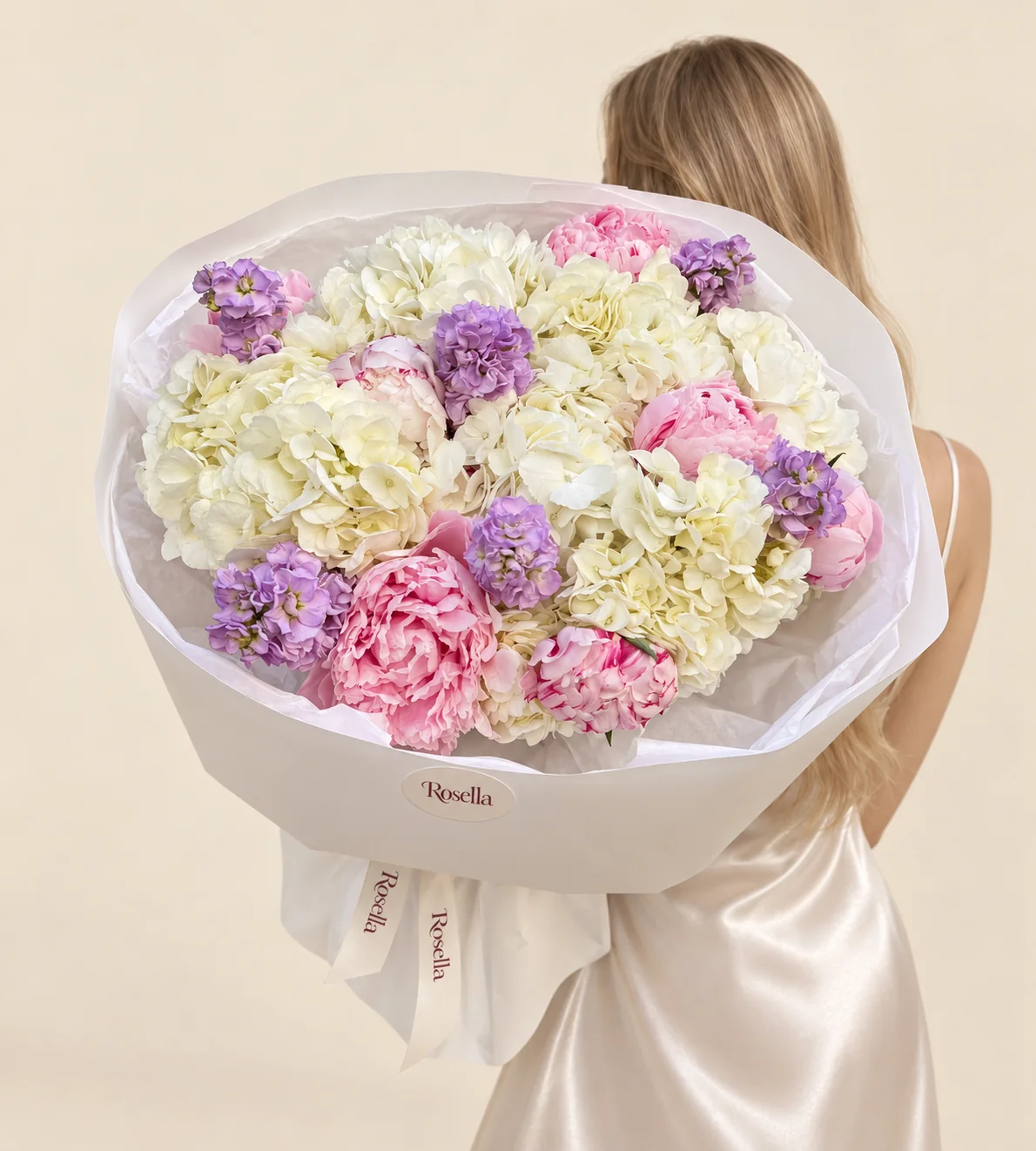 7 hydrangeas, 8 peonies & 6 stocks in a hand-tied bouquet
