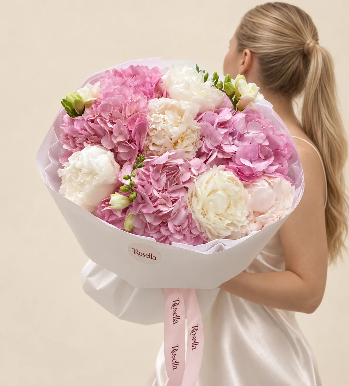 4 hydrangeas, 6 peonies & 2 freesias in a hand-tied bouquet