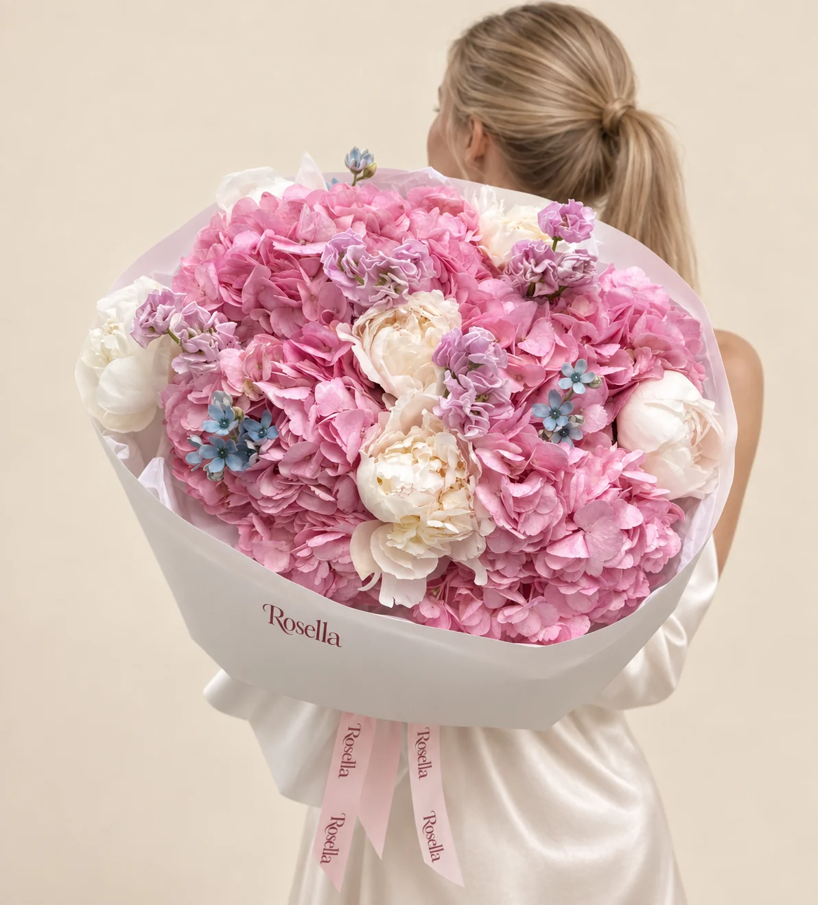 6 hydrangeas, 7 peonies, 2 stocks & 11 tweedia blooms in a hand-tied bouquet