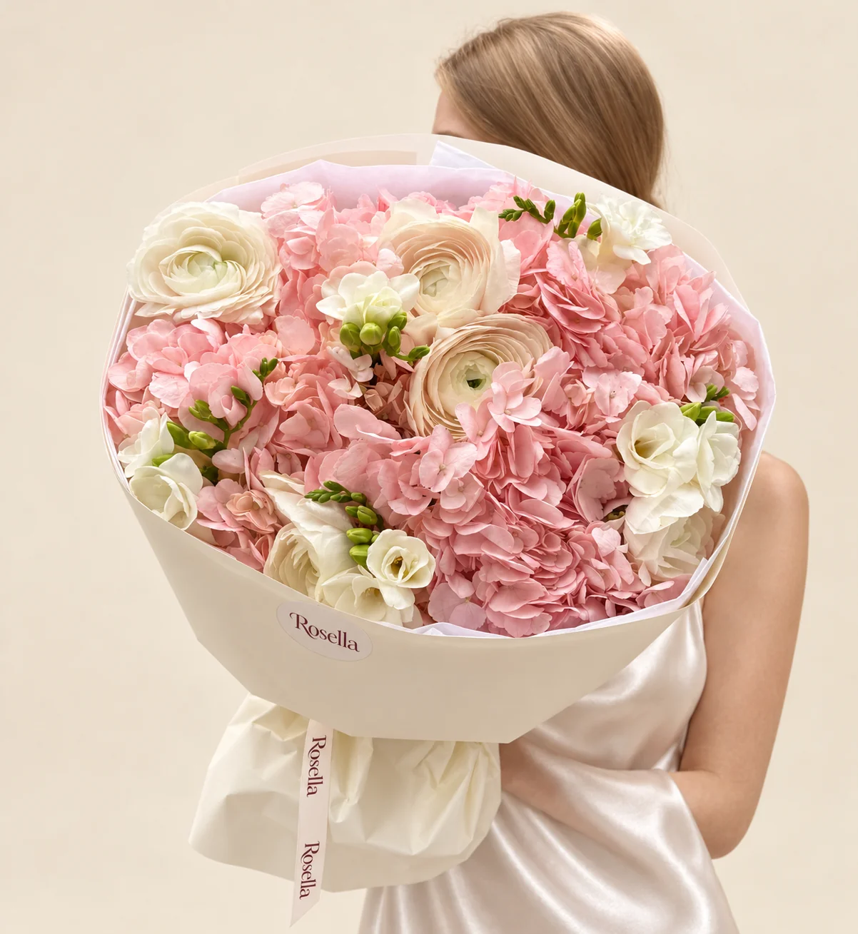 4 hydrangeas, 4 ranunculus & 4 freesias in a hand-tied bouquet