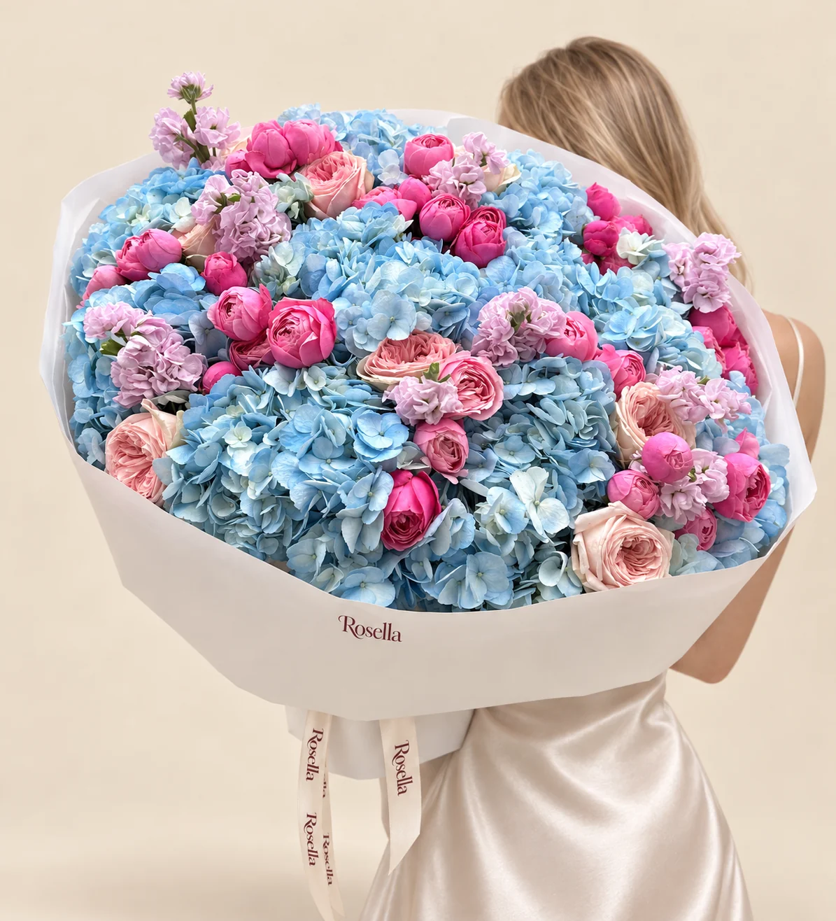 12 hydrangeas, 40 spray roses, 8 garden roses & 5 stocks in a hand-tied bouquet