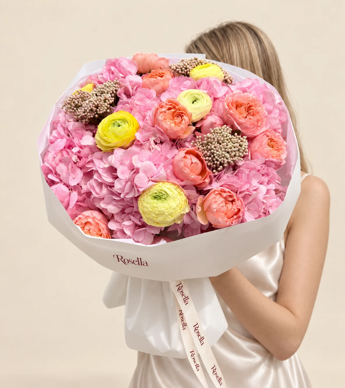 5 hydrangeas, 11 spray roses & 5 ranunculus in a hand-tied bouquet