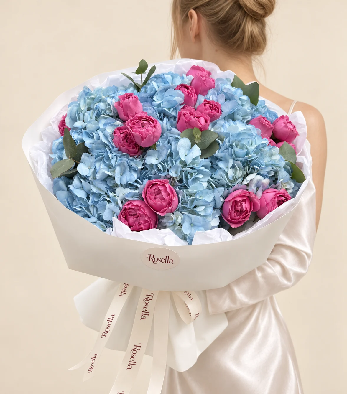 7 hydrangeas & 18 spray roses in a hand-tied bouquet