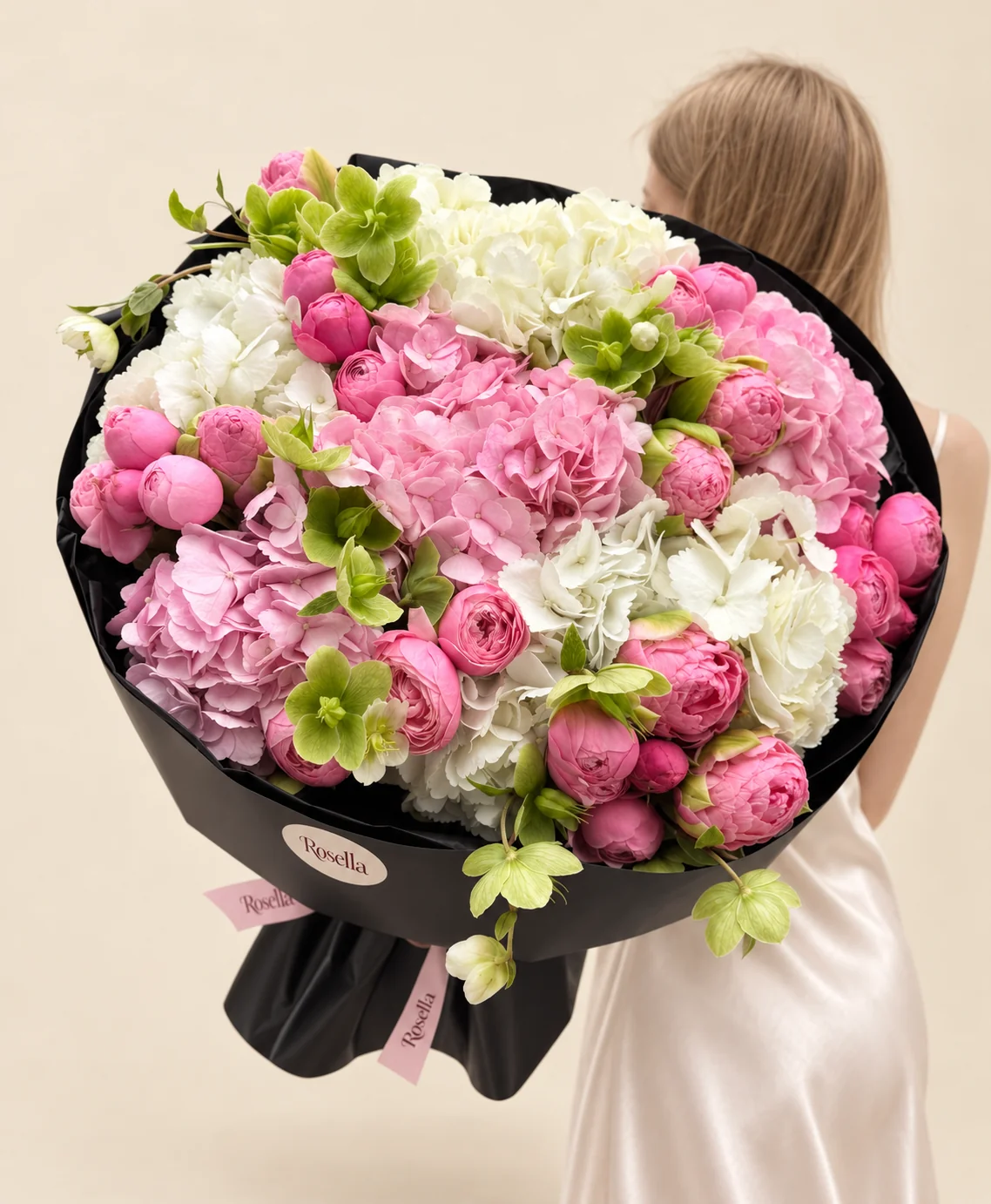 6 white hydrangeas, 30 tulips, 5 pink hydrangeas & 22 helleborus in a hand-tied bouquet
