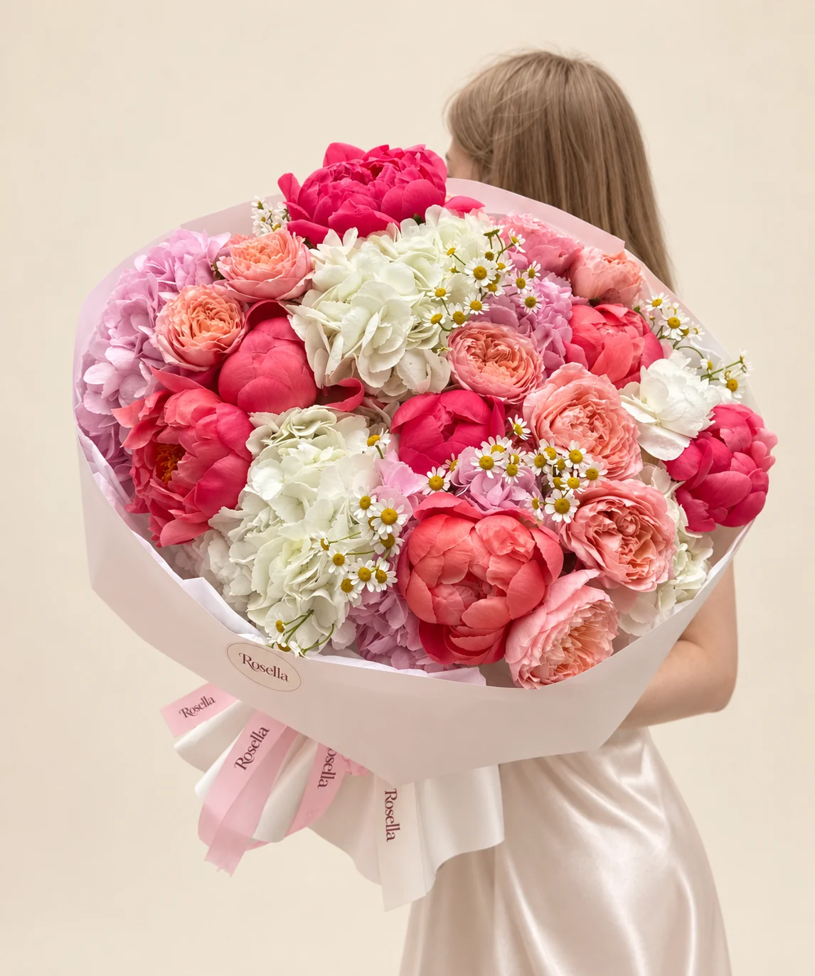 9 peonies, 10 garden roses, 4 white hydrangeas, 4 pink hydrangeas & 50 chamomile blooms in a hand-tied bouquet