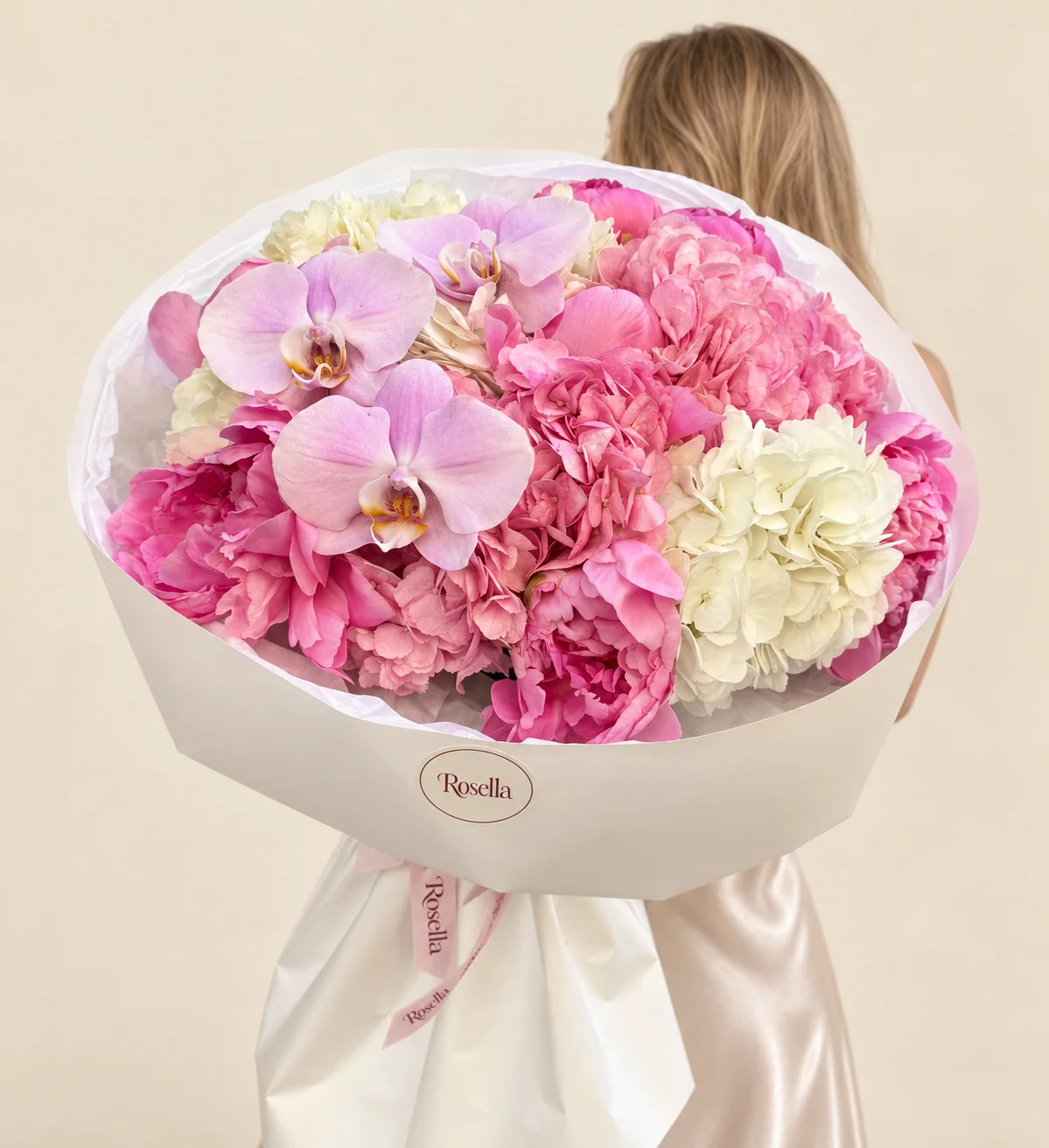 9 peonies, 4 pink hydrangeas, 4 cream hydrangeas & 3 orchid blooms in a hand-tied bouquet
