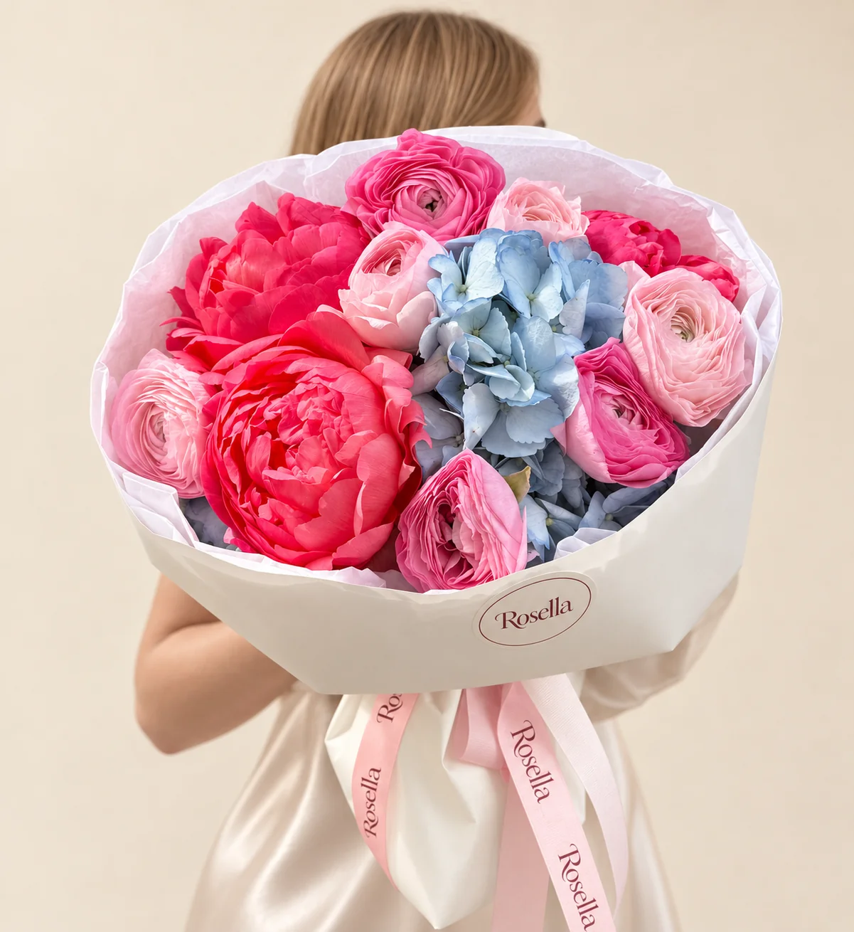 3 peonies, 1 hydrangea, 4 pink ranunculus & 3 pink ranunculus in a hand-tied bouquet
