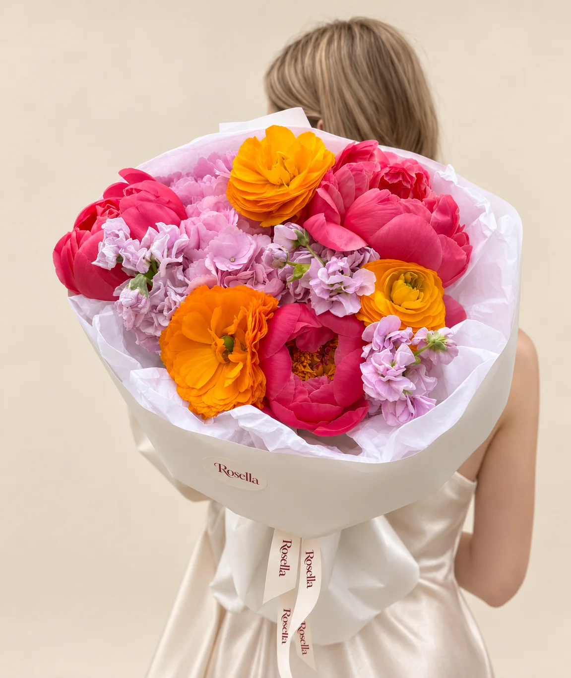 5 peonies, 1 hydrangea, 2 stocks & 3 ranunculus in a hand-tied bouquet