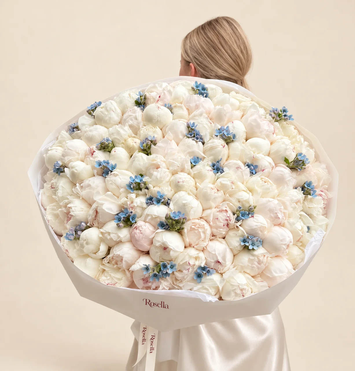 120 peonies & 150 tweedia blooms in a hand-tied bouquet