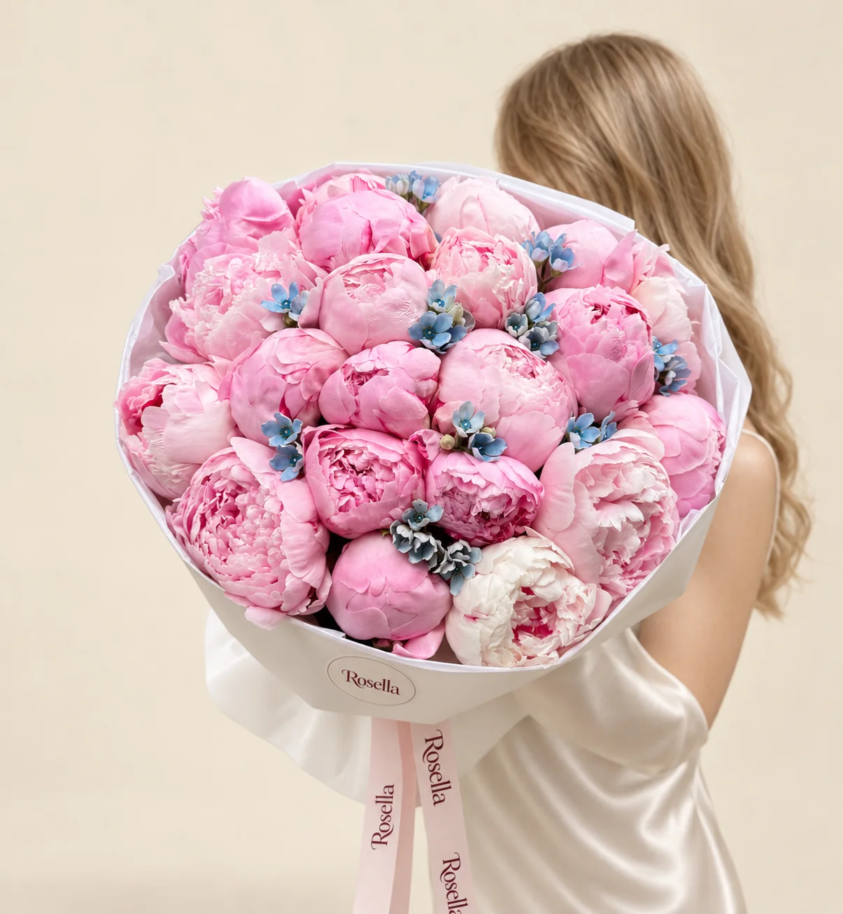 21 pink peonies, 4 blush peonies & 32 tweedia blooms in a hand-tied bouquet