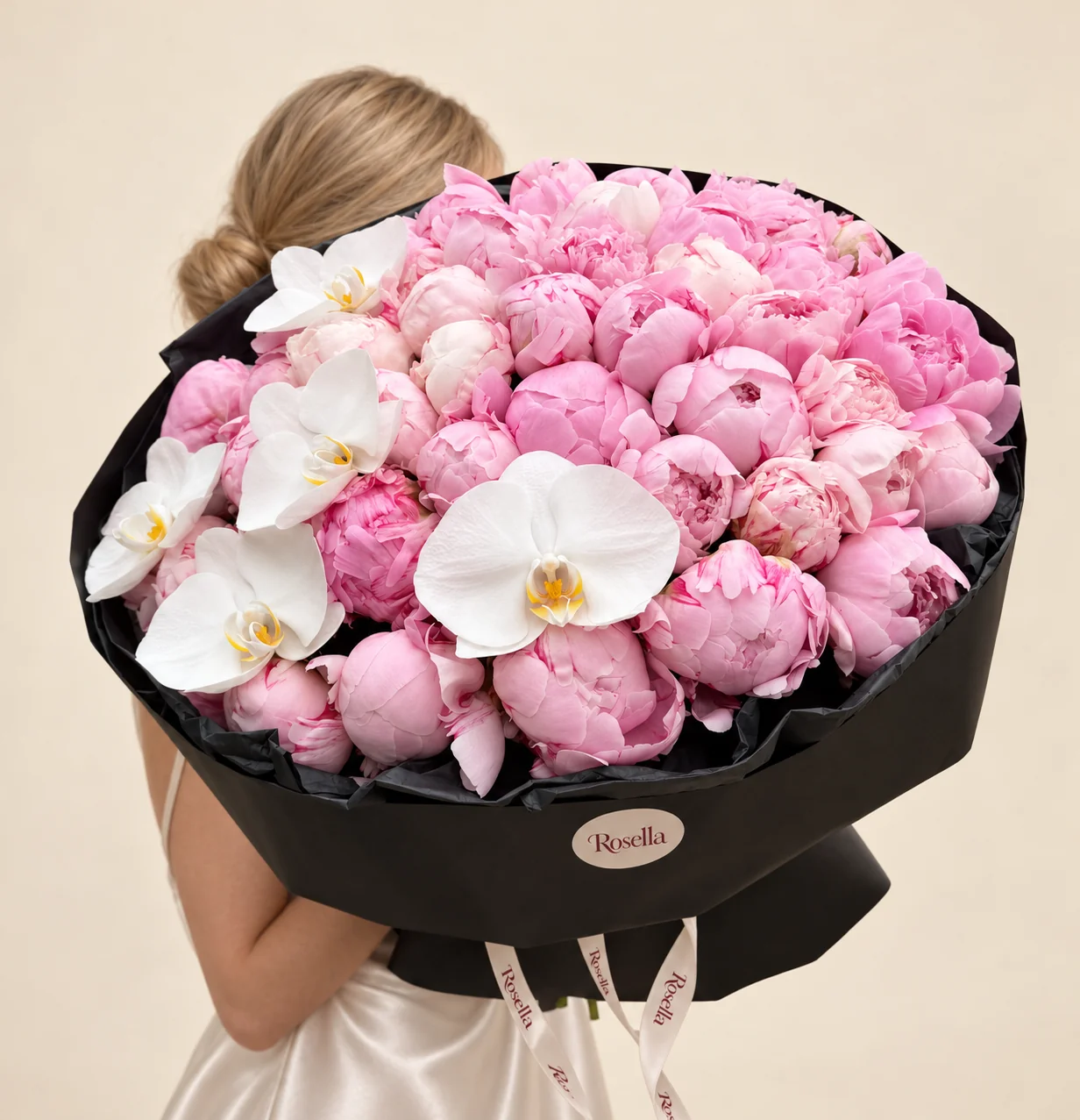 40 peonies & 5 orchid blooms in a hand-tied bouquet