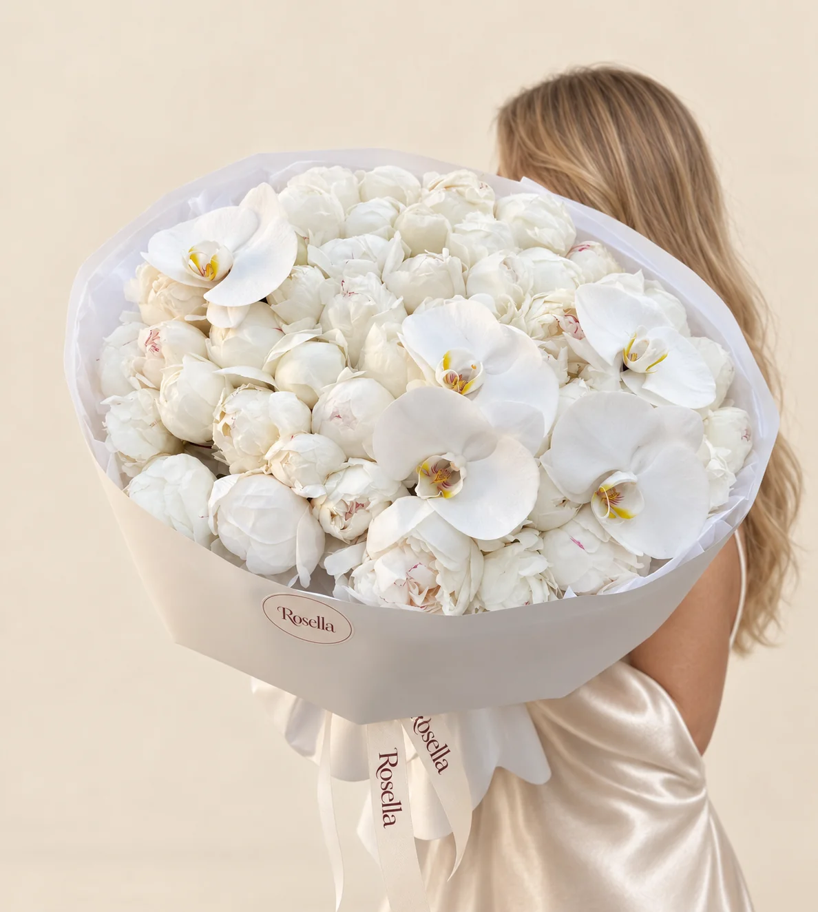 43 peonies & 5 orchid blooms in a hand-tied bouquet
