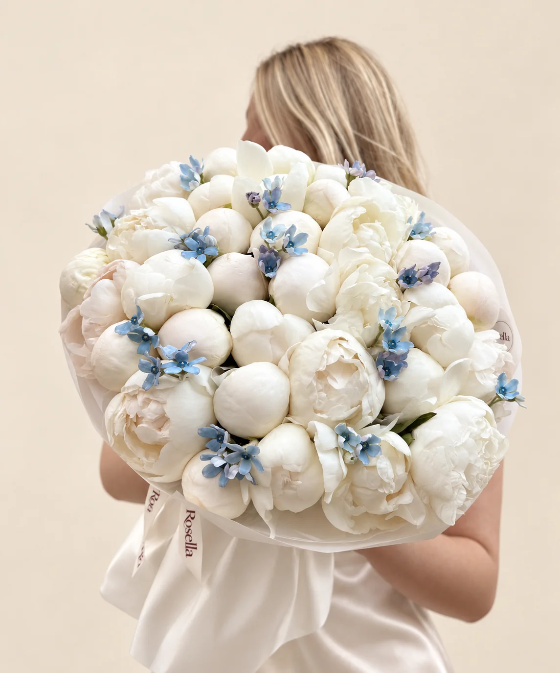 36 peonies & 40 tweedia blooms in a hand-tied bouquet