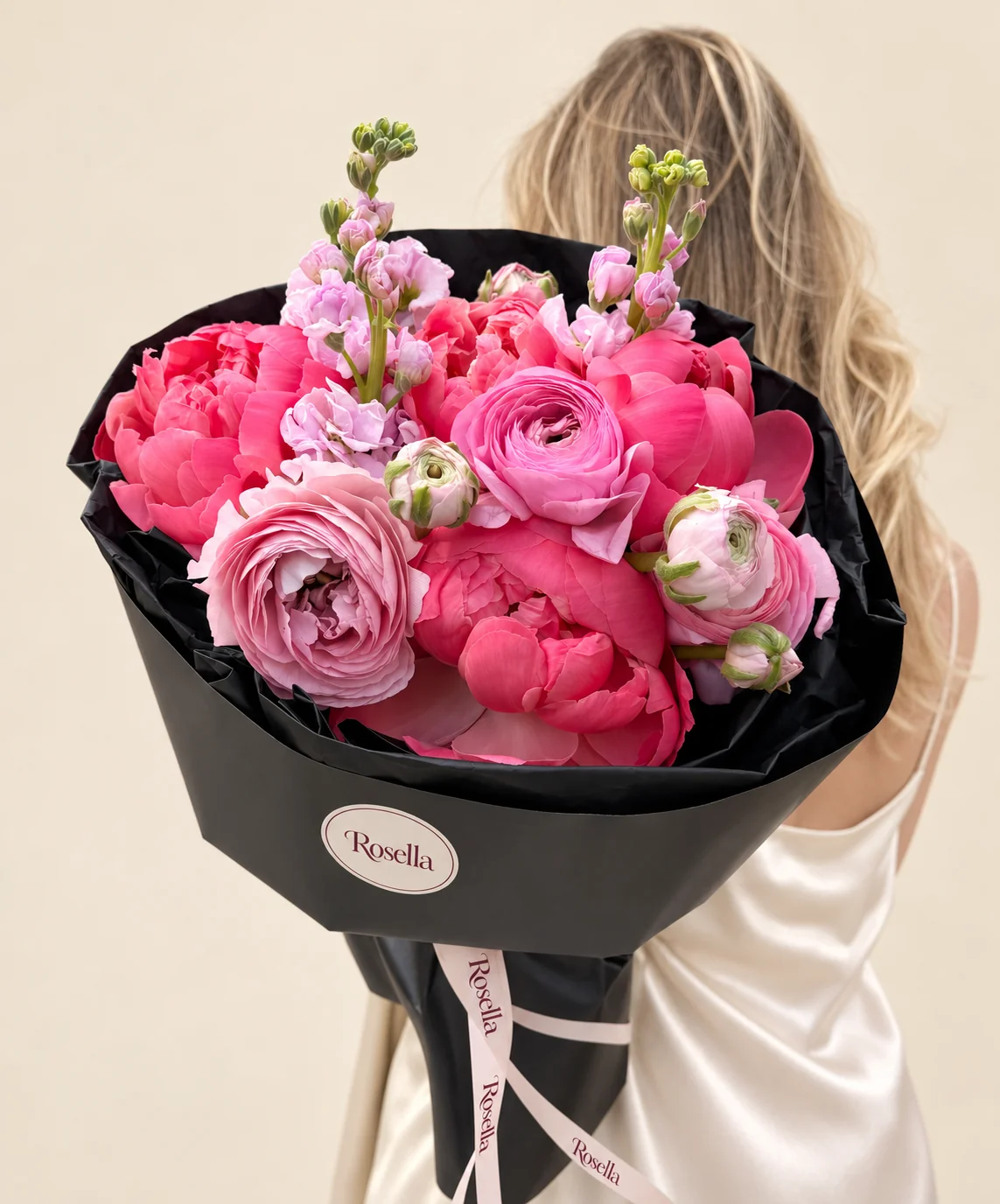 5 peonies, 6 pink ranunculus, 2 stocks & 1 pink ranunculus in a hand-tied bouquet