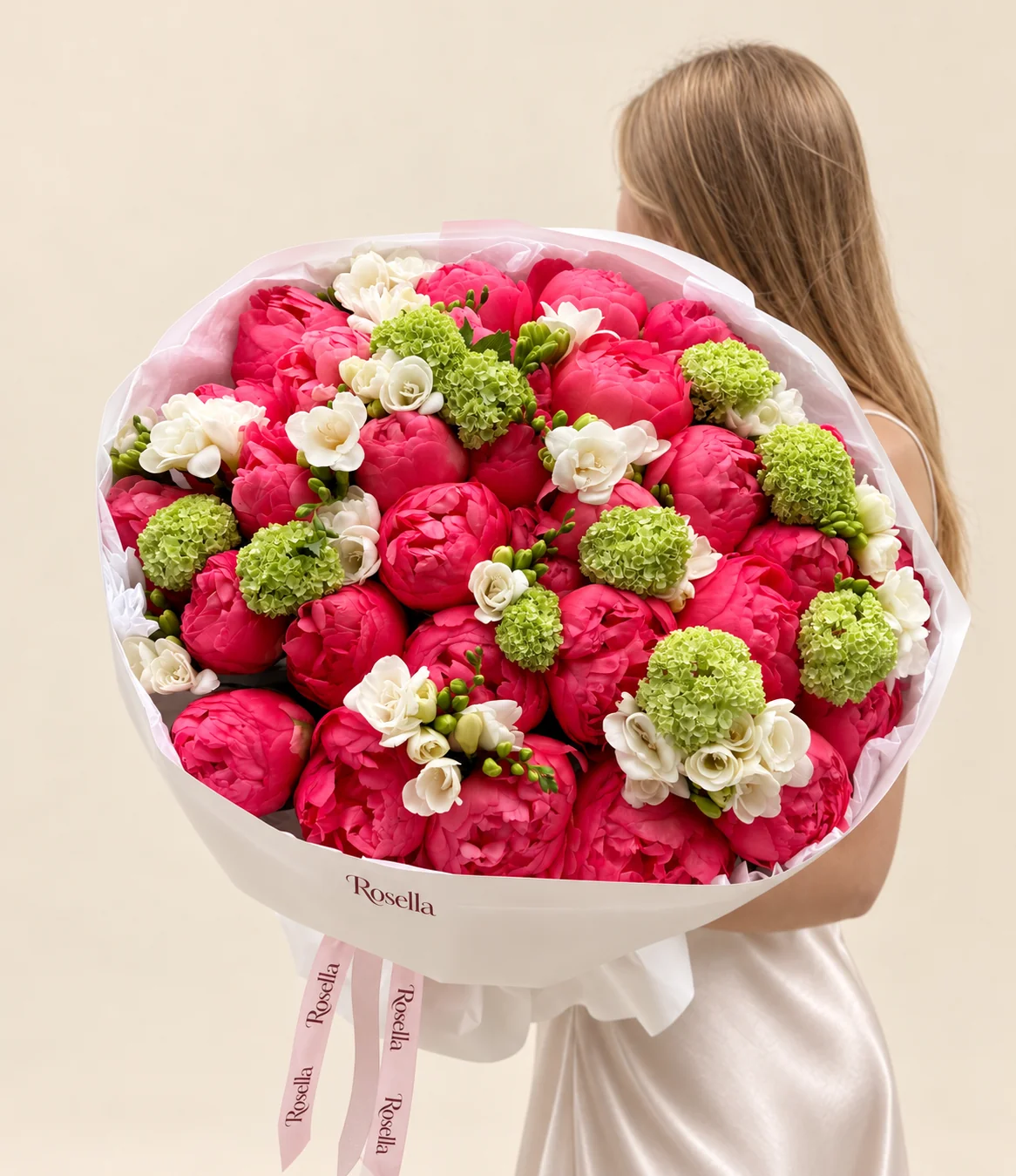 33 peonies, 12 green snowball viburnum & 12 freesias in a hand-tied bouquet