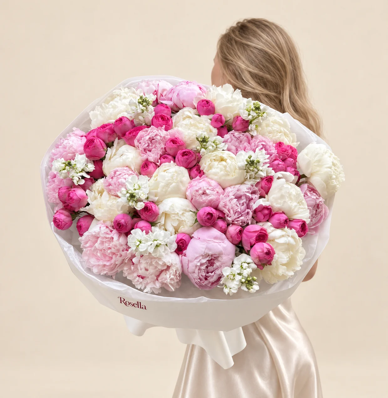 16 pink peonies, 16 white peonies, 48 spray roses & 5 stocks in a hand-tied bouquet