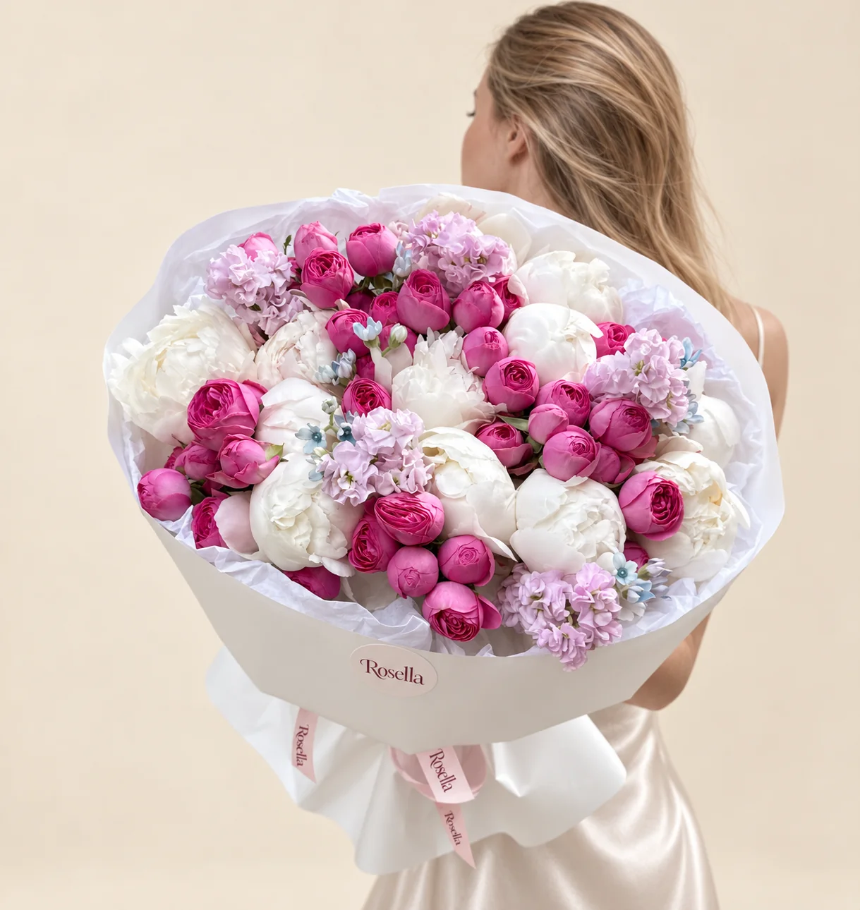 15 peonies, 40 spray roses, 4 stocks & 14 tweedia blooms in a hand-tied bouquet