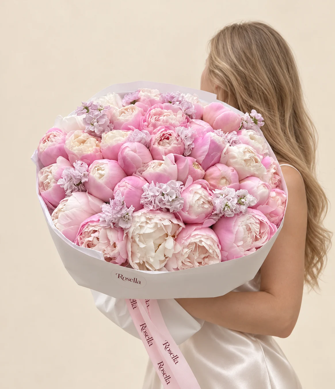 36 peonies & 8 stocks in a hand-tied bouquet