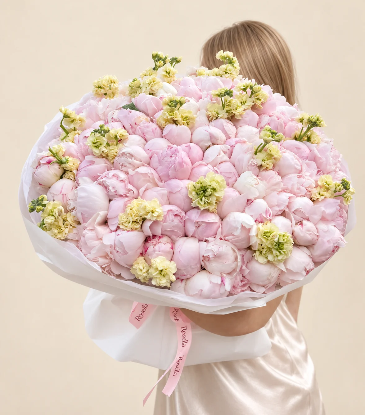 90 peonies & 12 stocks in a hand-tied bouquet