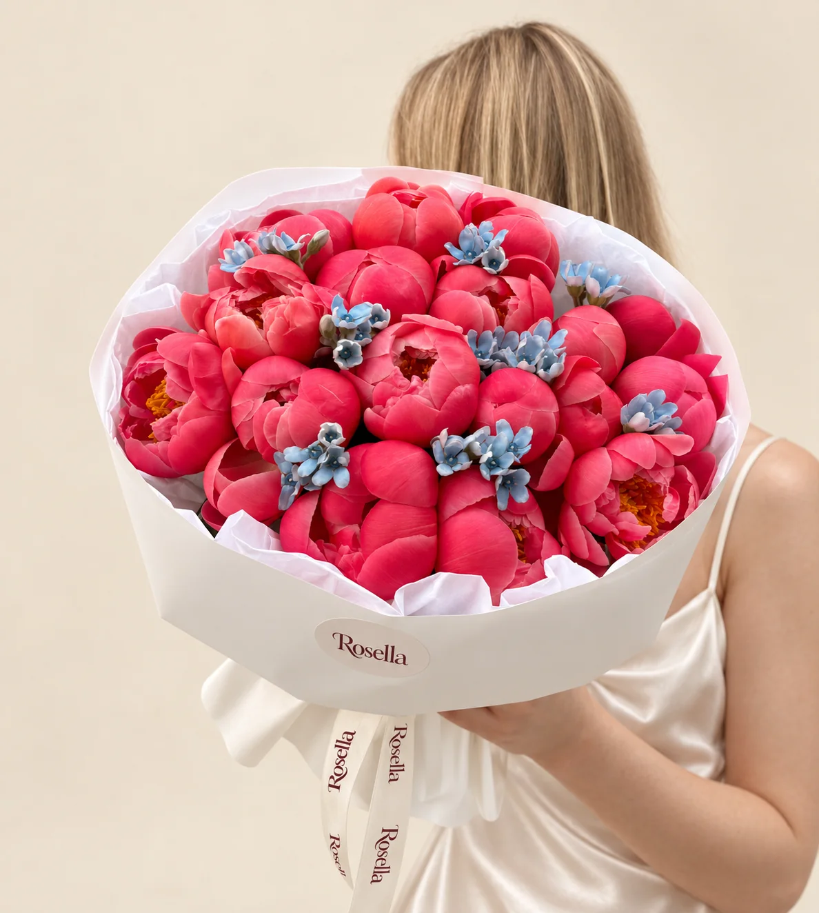 21 peonies & 40 tweedia blooms in a hand-tied bouquet