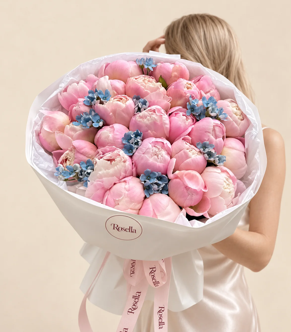 25 peonies & 43 tweedia blooms in a hand-tied bouquet