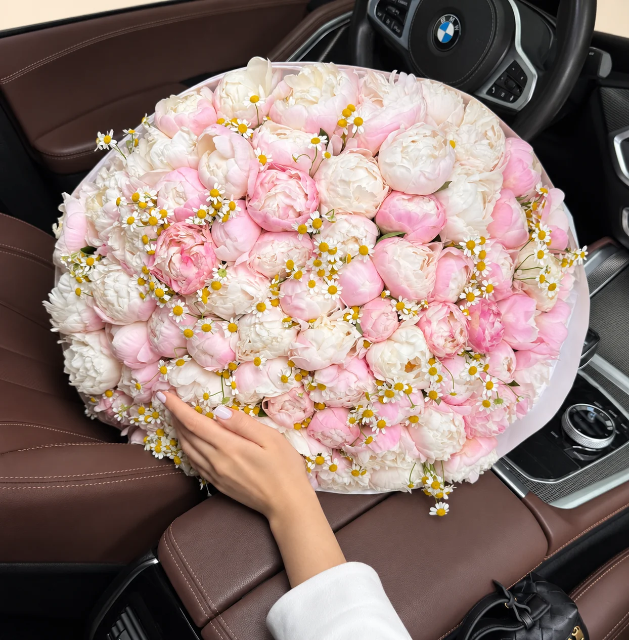 82 peonies & 180 chamomile blooms in a hand-tied bouquet