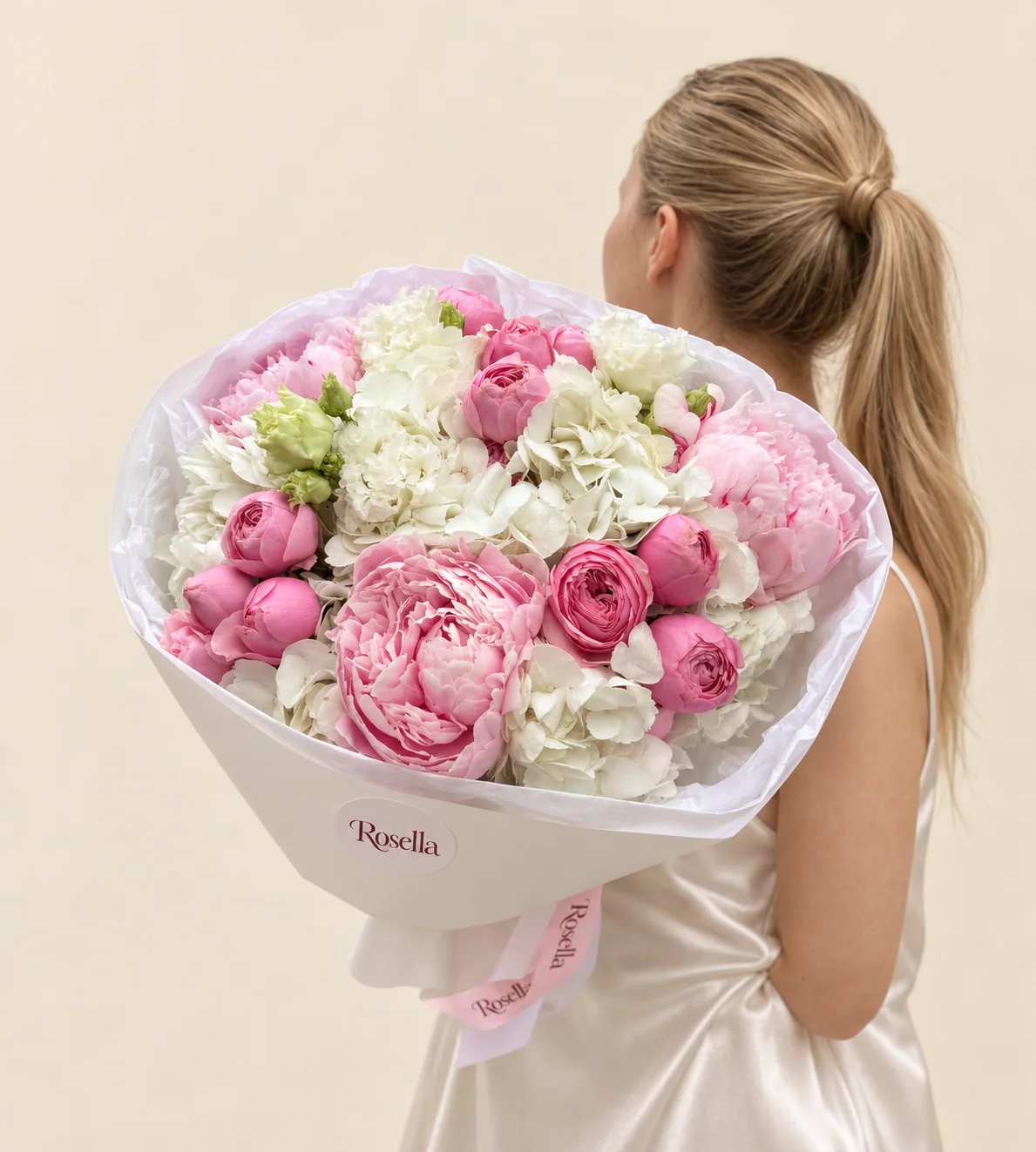 7 hydrangeas, 5 peonies, 12 spray roses & 8 lisianthus blooms in a hand-tied bouquet