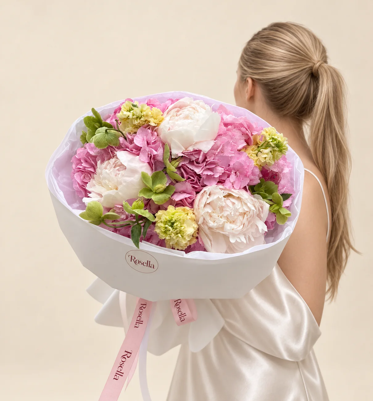 4 hydrangeas, 3 peonies, 3 stocks & 8 green hellebore in a hand-tied bouquet